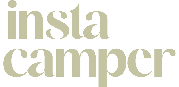 Light sage-colored “instacamper” logo on a transparent background.
