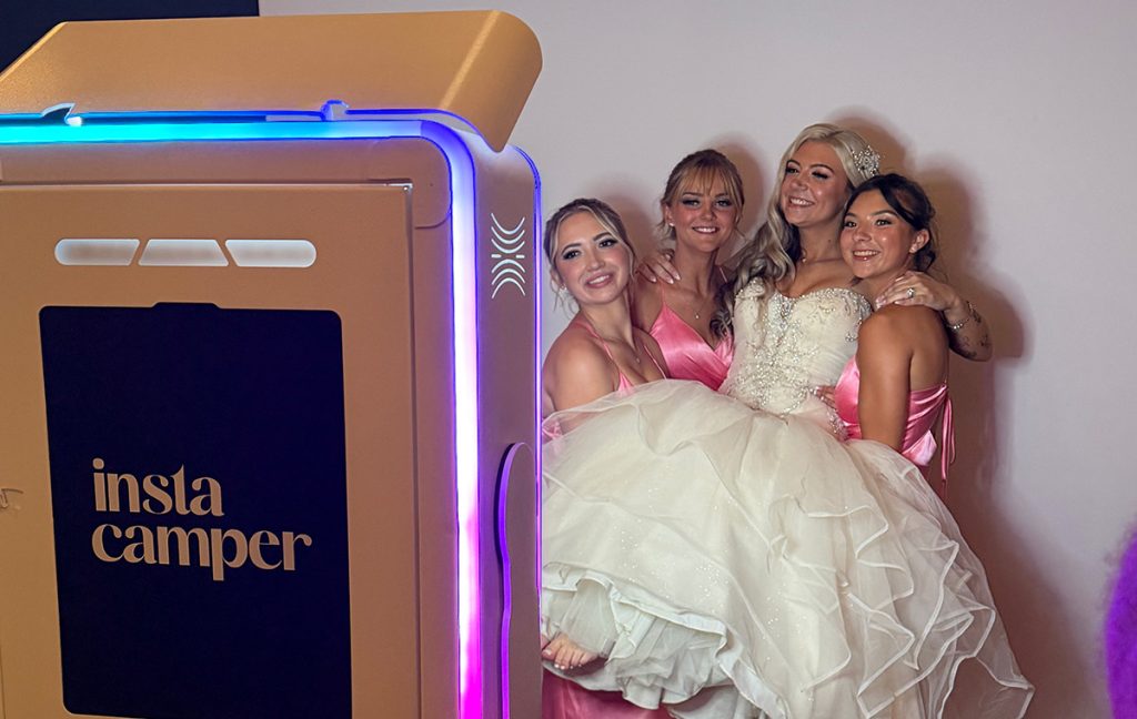 How a Photo Booth Creates More Candid Wedding Photos